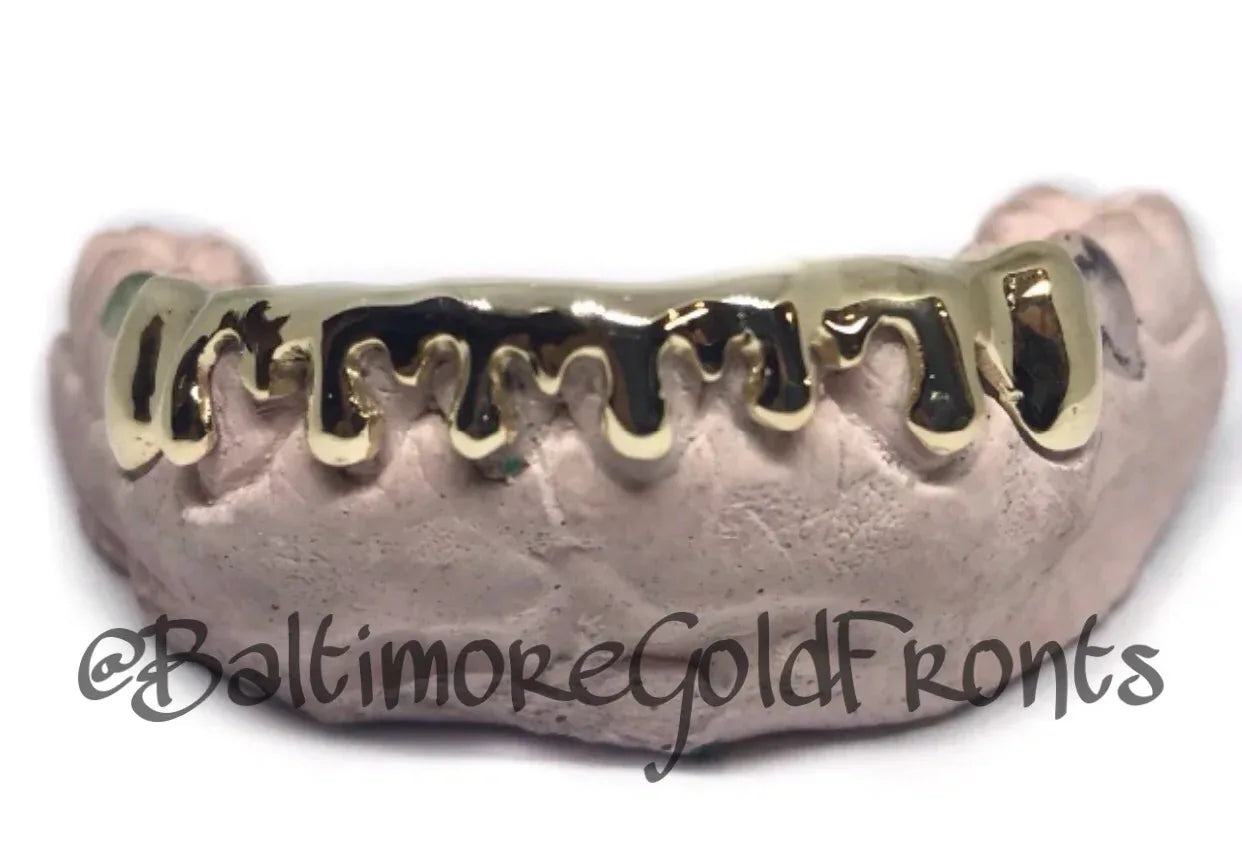 Gold Front Bar: 10k 8 Piece Drip Style Grillz  image 1